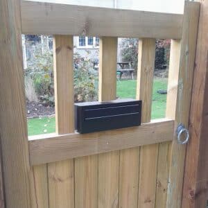 Post Box For Gates & Fences Outdoor Gatehouse W3-2 Front in Black Lifestyle Image Large Letterbox W3 2