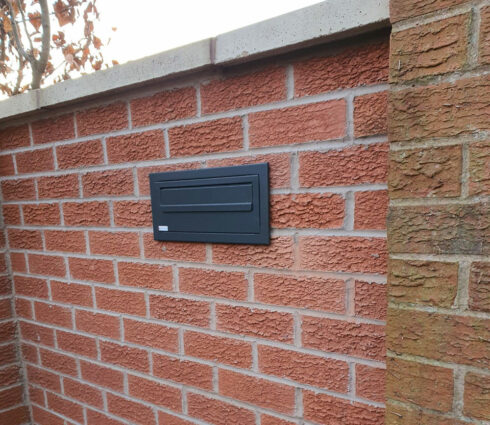 Through The Wall Letterbox Muretto Dark Grey Front Lifestyle Image