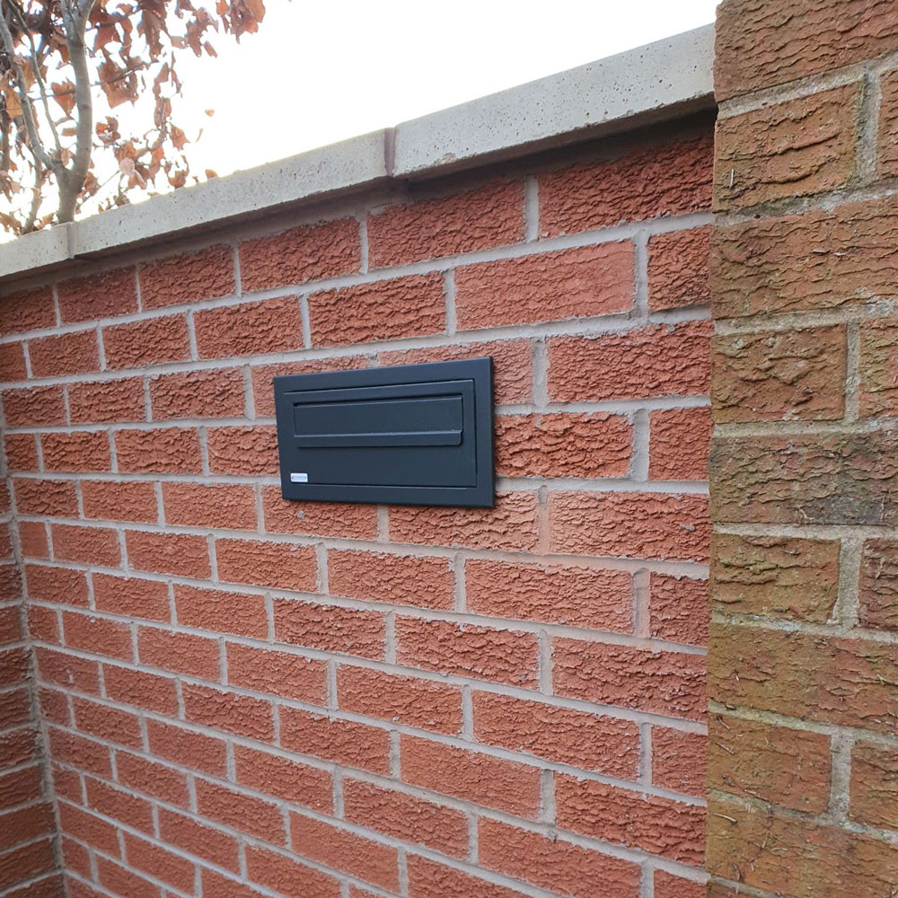 Through The Wall Letterbox Muretto Dark Grey Front Lifestyle Image