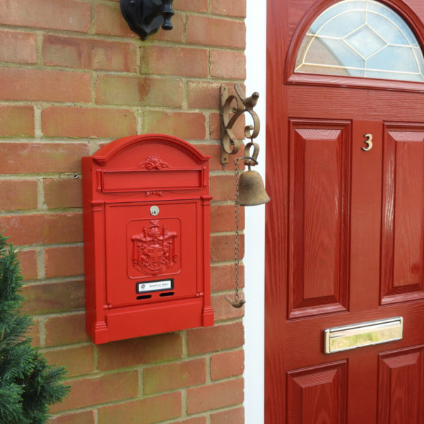 Red wall mounted post box