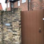SMN Through The Wall External Post Box mounted in a brick wall