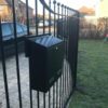 W3 Metal Post Box mounted on metal railings