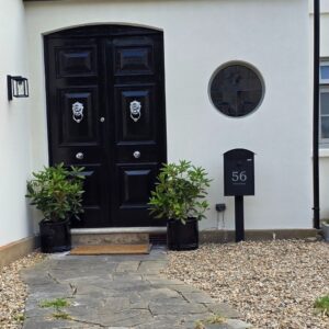Secured Outdoor Free Standing Letterbox Albertina In Black With FR 2 Stand Lifestyle Secured Outdoor Free Standing Letterbox Albertina In Black With FR 2 Stand Lifestyle
