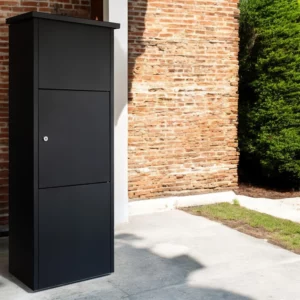 Goldcrest Parcel Box in Black - Freestanding Outdoor Solution Black outdoor parcel box for home, Goldcrest model, freestanding next to a wall