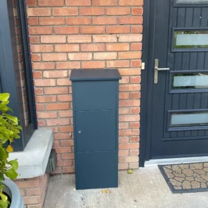 Goldcrest Parcel Box by Dark Grey Front Door - Customer Photo Outdoor parcel box Goldcrest positioned by a dark grey front door, customer-supplied photo