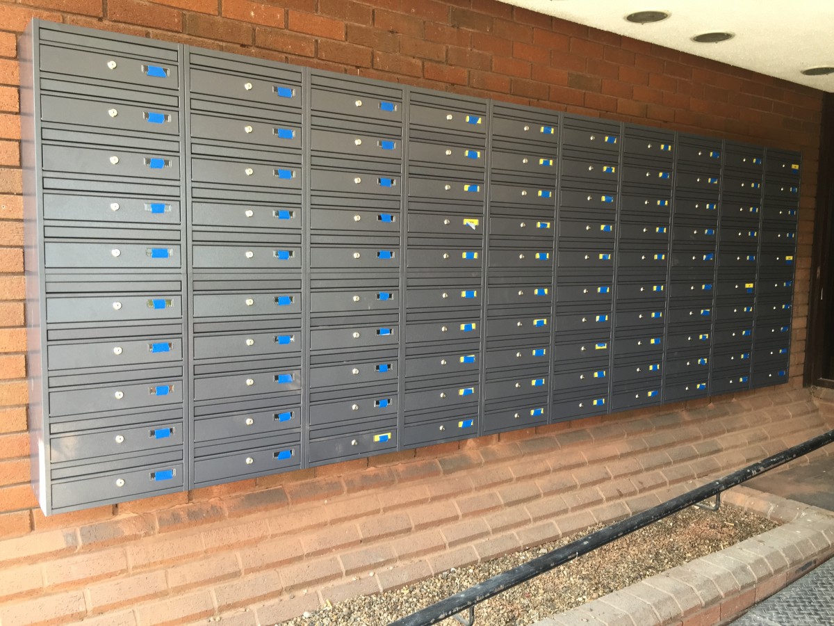 Dark grey multiple  wall mounted letterboxes