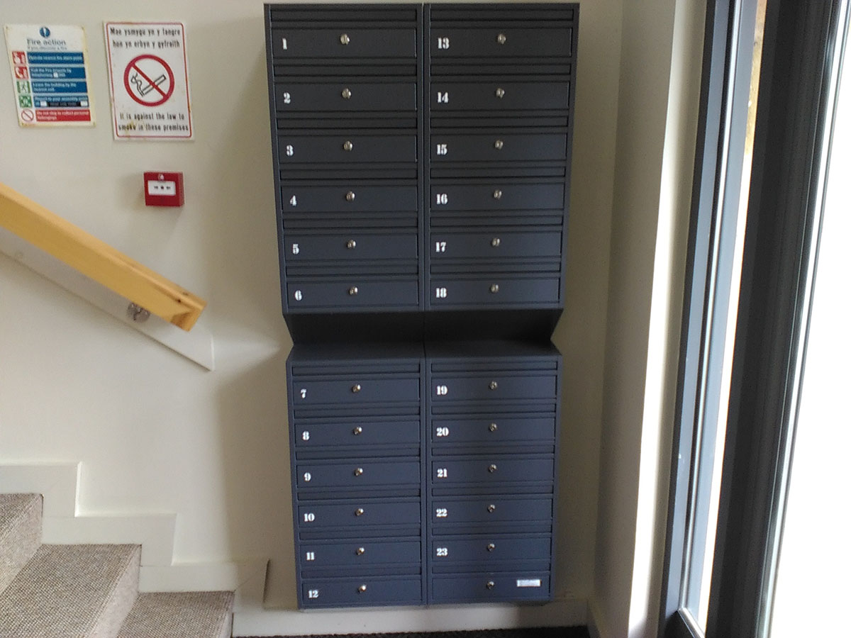 Wall mounted multi occupancy letterboxes E1s for narrow spaces